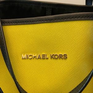 Large Michael Kors bag with matching wallet.